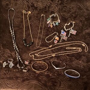 Costume jewelry lot. Anne Klein, Avon, Sarah Coventry, Monet, and unbranded.